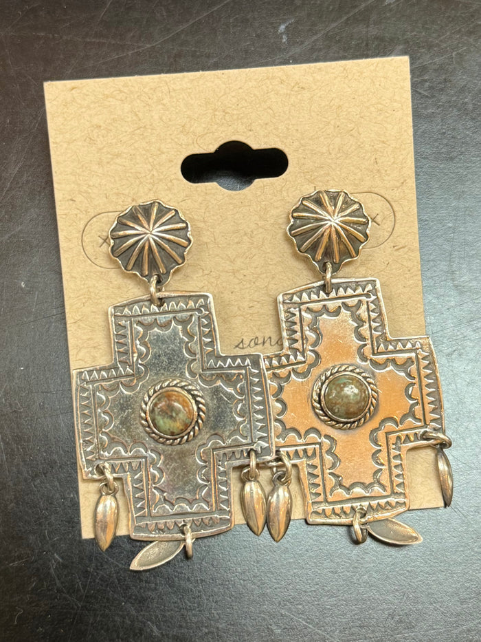 Ornate cross dangle stud earrings with round green gemstone centers, silver-tone metal