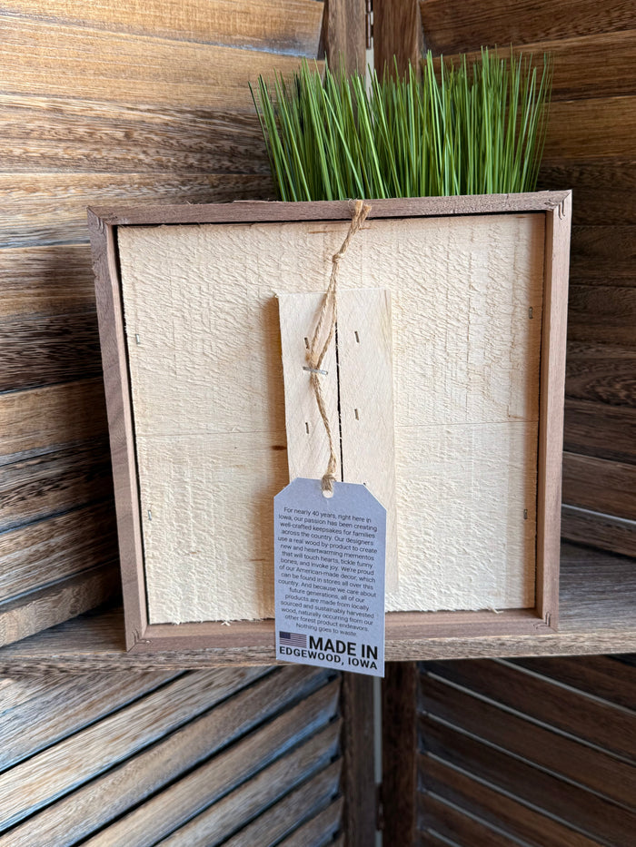 Wood-framed 8x8 artwork back view with paper backing and hanging tag