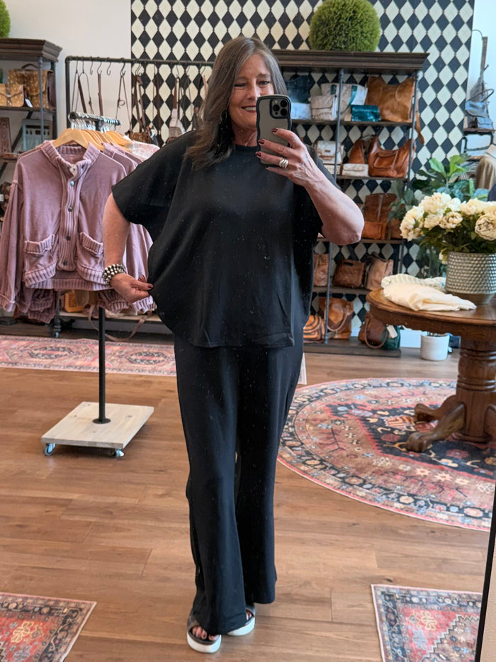 Black relaxed short-sleeve T-shirt with matching wide-leg pants set