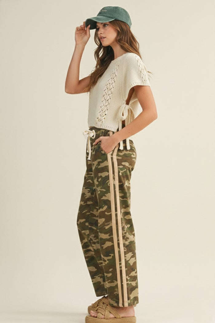 Camo varsity stripe sweatpants with white side stripes, drawstring waist, relaxed fit