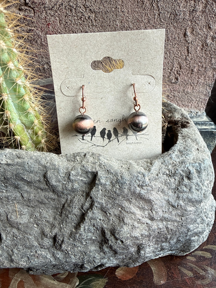Fishhook earrings with copper hooks and round dark gray dangling beads