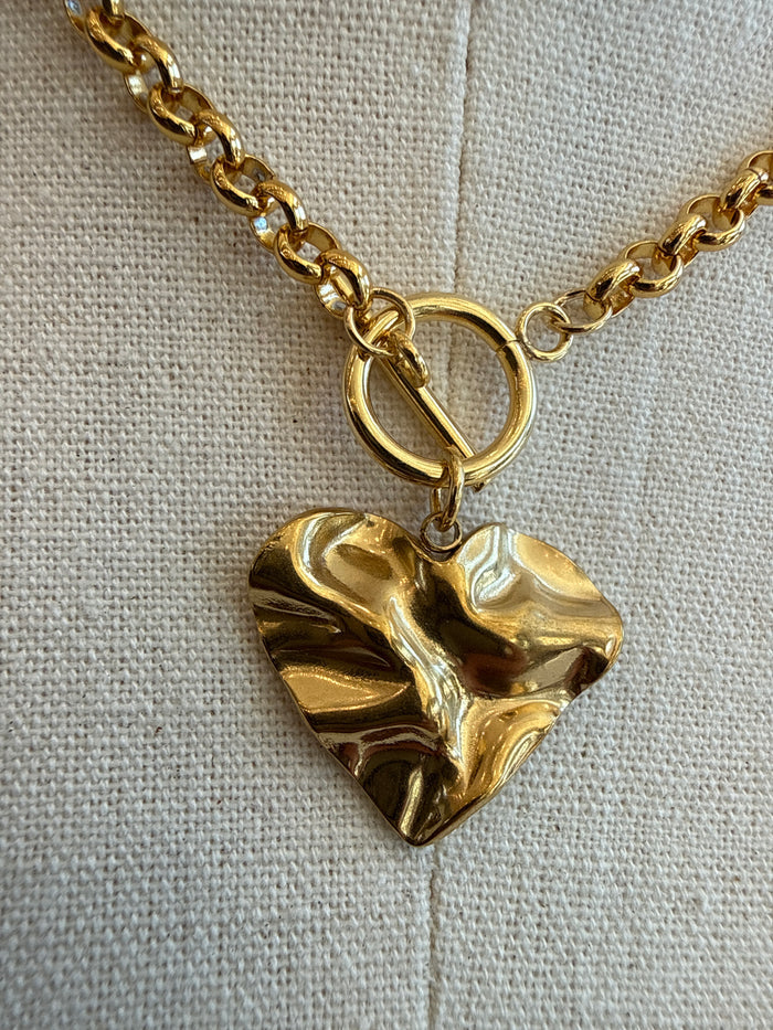 Gold-tone hammered heart pendant with toggle clasp and link chain