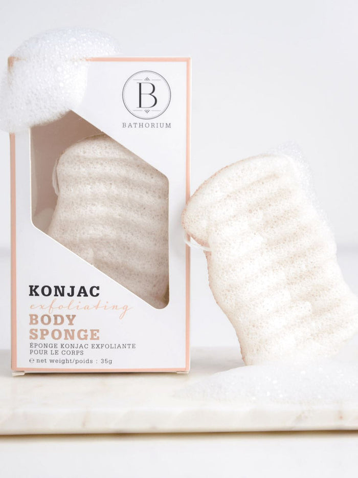 Konjac Walnut Exfoliating Body Sponge | Bathorium displayed with lathered foam, showing natural texture designed for gentle skincare exfoliation and body care wellness.