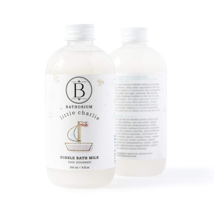 Clear plastic bottle of little charlie™ Bubble Bath Milk | Bathorium with white label featuring a simple boat illustration, designed for skincare and body care wellness.