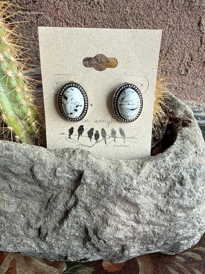 Oval white buffalo stud earrings with silver beaded oval stones