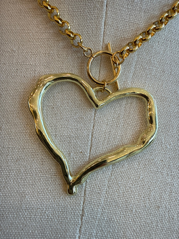Gold-tone chunky heart pendant with round toggle clasp detail necklace