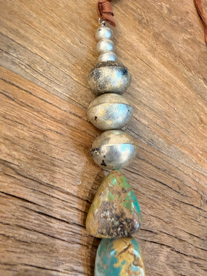 Turquoise bead and brown leather strand necklace with silver-tone round beads