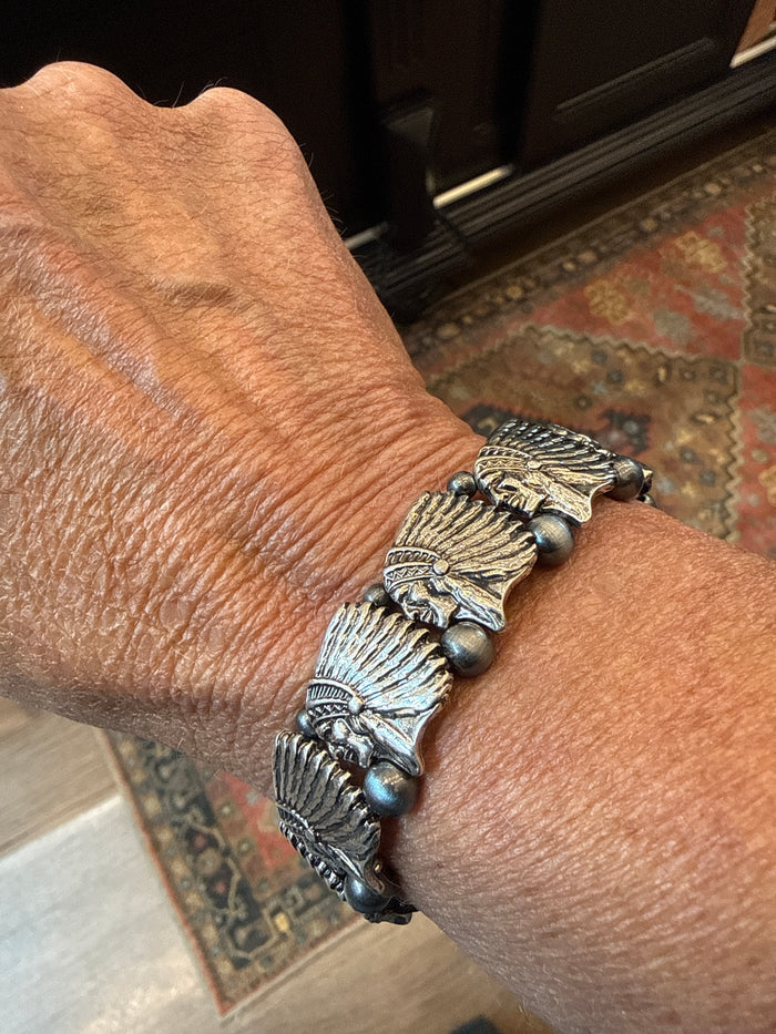 War chief stretch bracelet with silver-tone carved warrior charm and bead accents