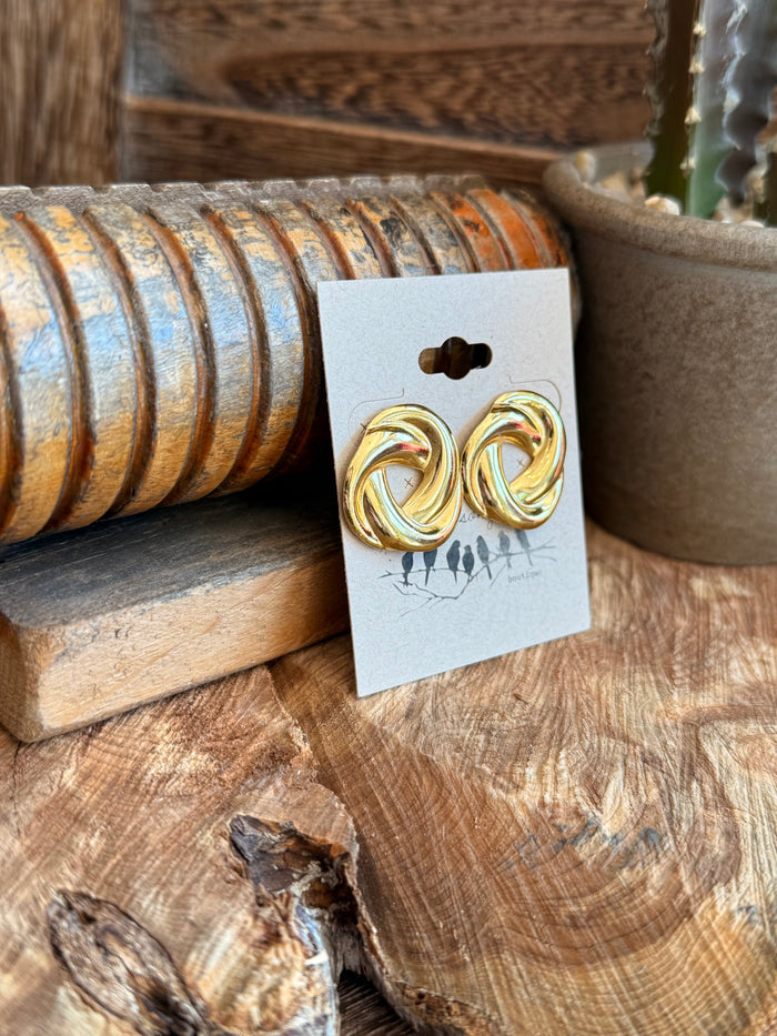 Gold-plated whirling stud earrings with twin twisted spiral loop fronts