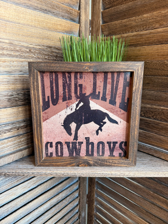 Rustic wood framed cowboy artwork with horse silhouette and 'Cowboys' text