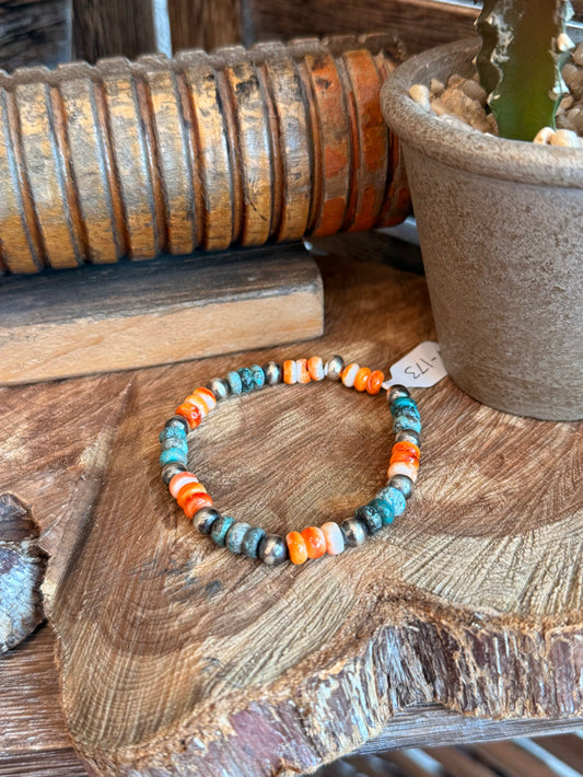 Stretch bracelet with turquoise blue and orange spiny oyster bead accents