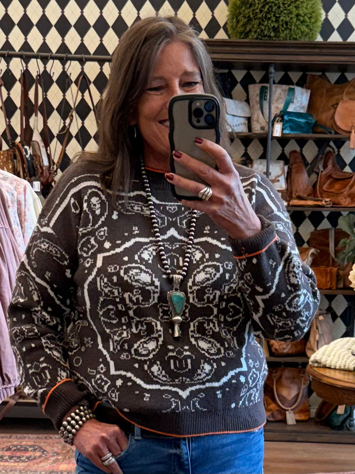Chocolate brown crew neck sweater with cream paisley knit pattern and long sleeves