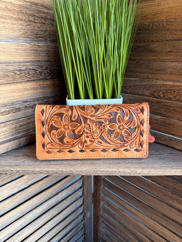 Tooled leather wallet with embossed floral design, tan-orange color and stitched edge