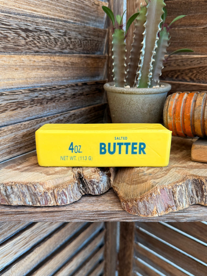 Yellow butter-shaped squishy, 4 oz salted, net wt 113 g