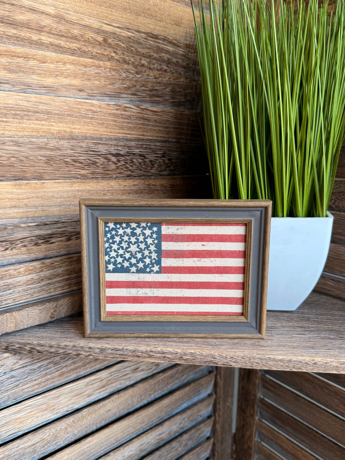 Framed American flag wall art with red and white stripes and blue star canton