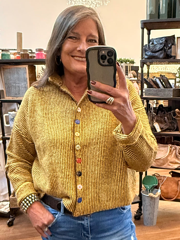 Mustard striped knit cardigan with button front and multicolor round buttons