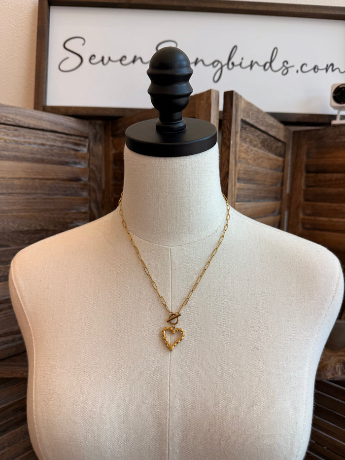 Gold-plated heart toggle clasp necklace with delicate chain and small heart pendant