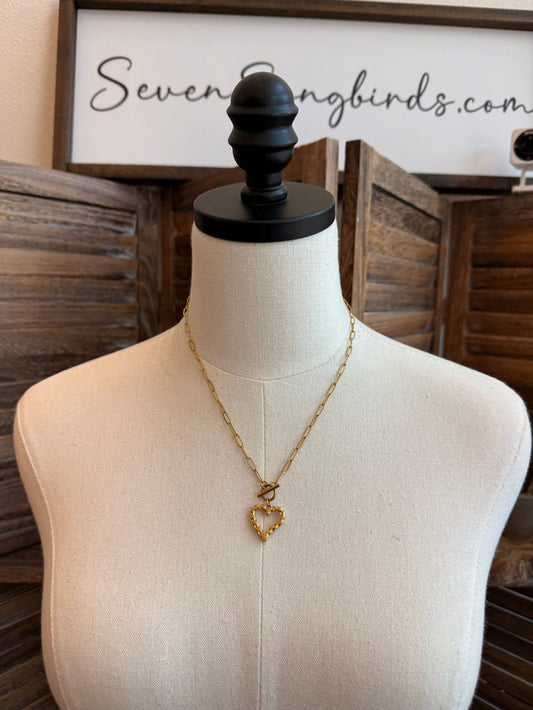 Gold-plated heart toggle clasp necklace with delicate chain and small heart pendant