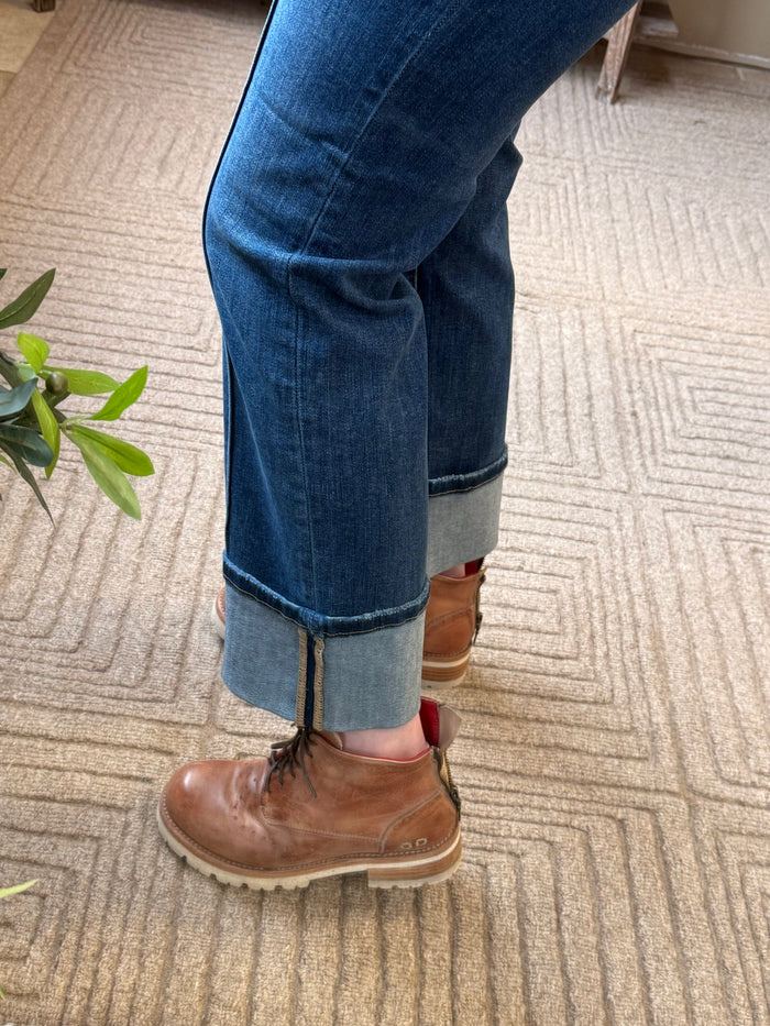 Dark blue cuffed jeans, slim leg with distressed hemline and stitched seams