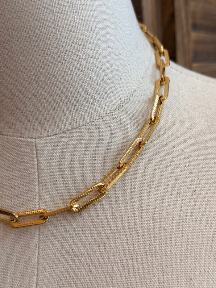 Gold-plated chunky chain necklace detail, oval links with small end connector