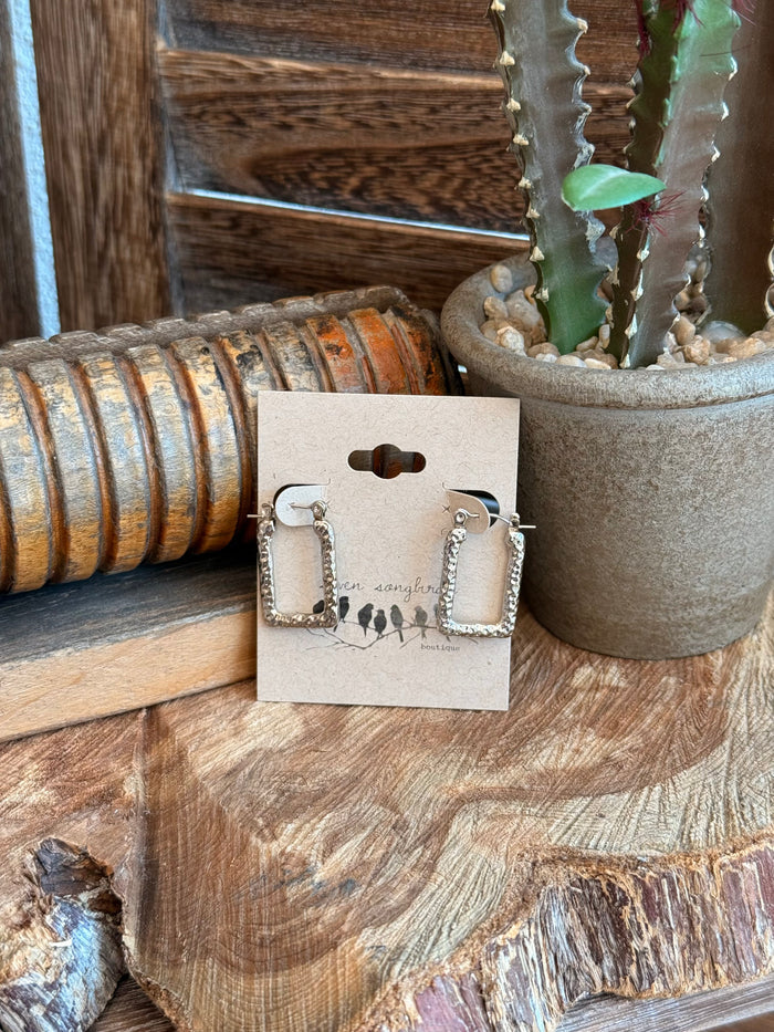 Silver textured trapezoid stud earrings with openwork frames and metal posts