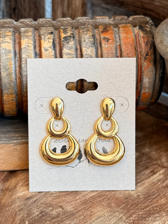 Gold-plated triple hoop drop stud earrings, dangling round tiers on stud posts