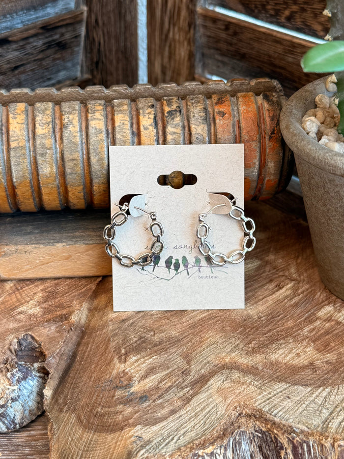 Silver-tone chain link round stud earrings with small dangling charm pair