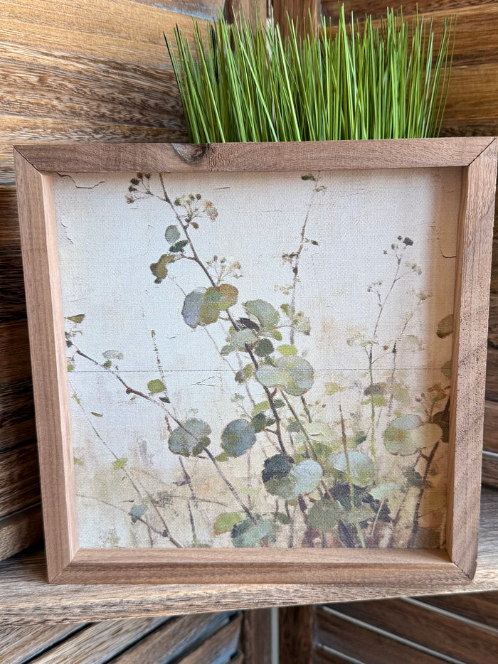 Wood-framed 8x8 botanical leaf landscape artwork, pale print with green leaves
