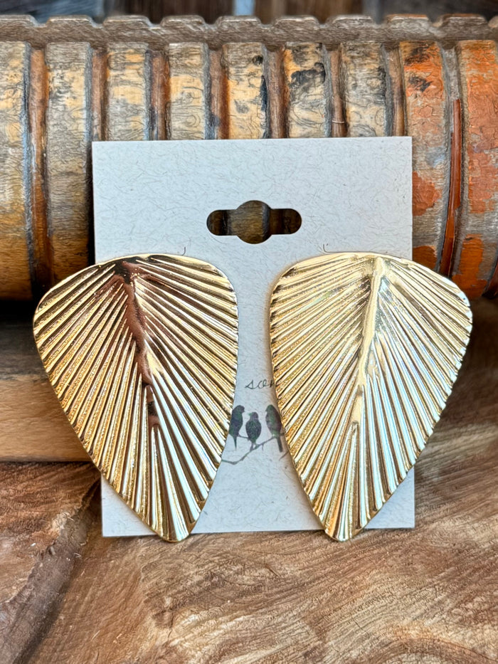Large gold ribbed leaf stud earrings on backing card, heart-shaped leaf profile