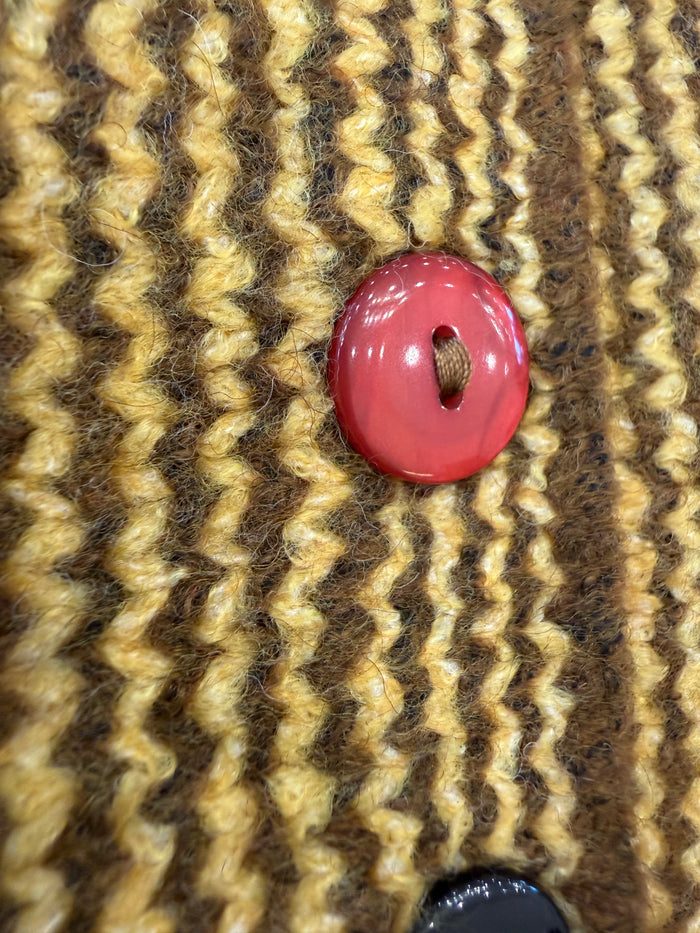 Striped knit cardigan fabric with red and purple round buttons