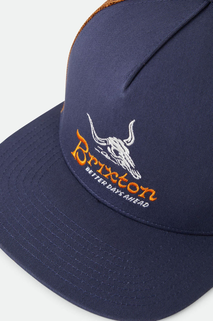 Unisex Barren Netplus Trucker Hat in the color Navy/Brown Sugar - Additional Laydown image