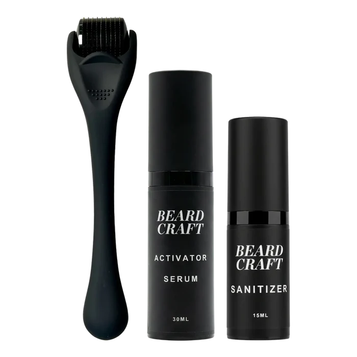 Beard Craft skjeggvekstsett med roller, serum og renser på hvit bakgrunn