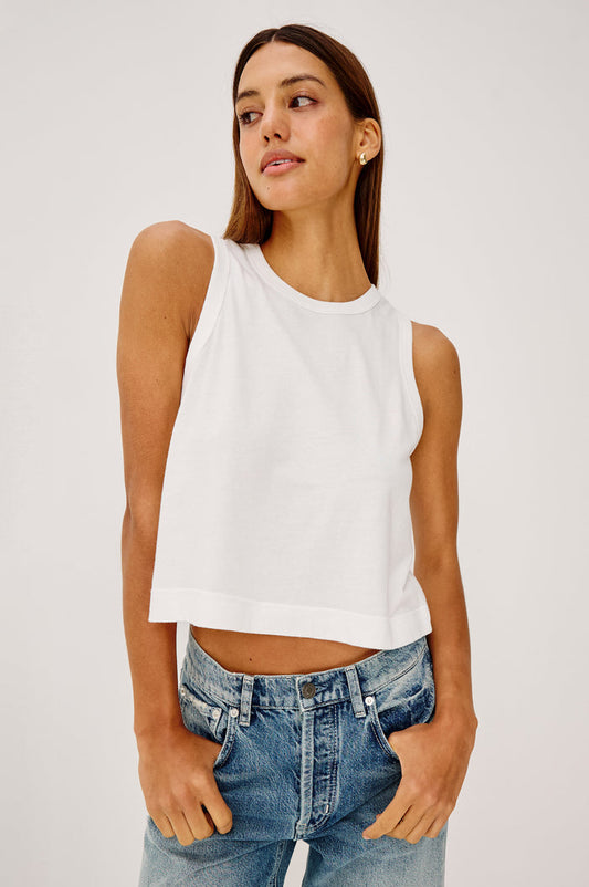 The Boxy Tank in 100% Cotton With Crew Neckline, Wide Shoulder Straps, and a Cropped, Boxy Fit in White Colorway - Upper Body Front View Featured on Model