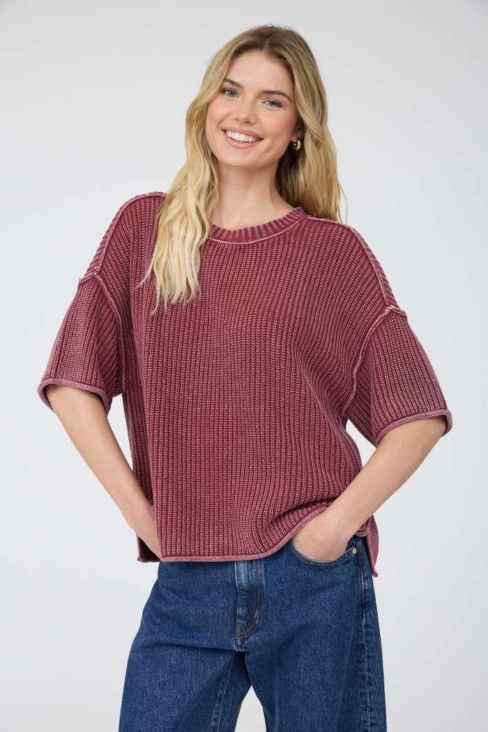 Burgundy mineral-washed short-sleeve sweater with ribbed crew neck and relaxed fit