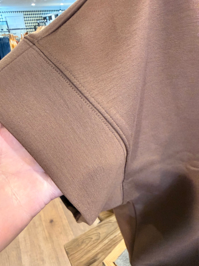 Cocoa 1/4 zip T-shirt sleeve and hem detail
