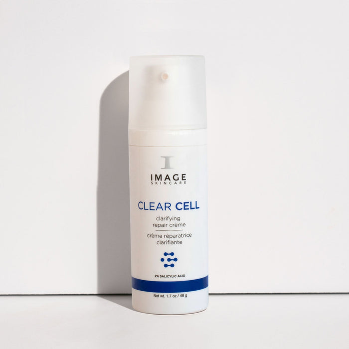 CLEAR CELL clarifying repair crème | IMAGE Skincare in a white pump bottle with blue accents, designed for skincare and body care to support clear skin and repair.
