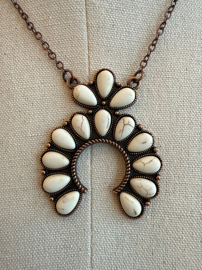 Copper squash-stone pendant necklace with large round center and white teardrop stones