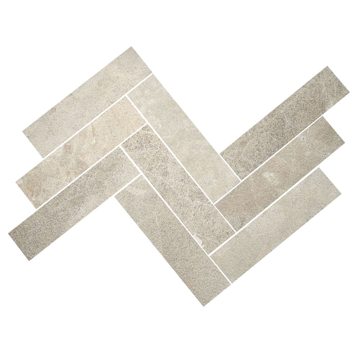 Limestone parquet arranged in a herringbone pattern on a white background