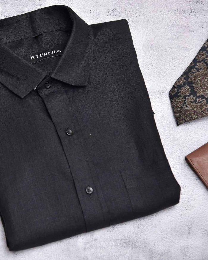 Black men's linen shirt with button front and ETERNIA neck label