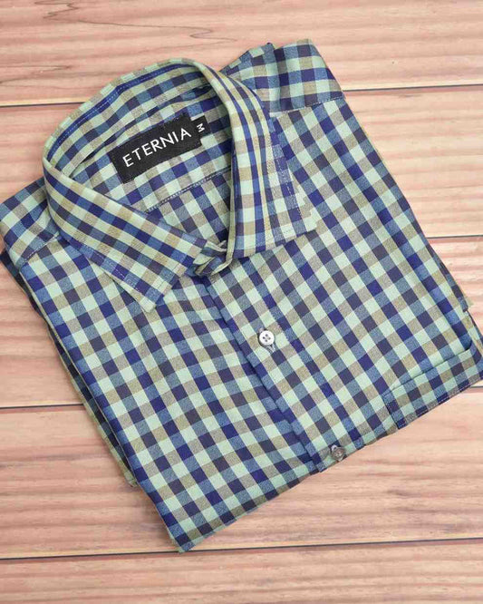 Men's linen shirt, blue and light green checkered pattern, folded with button placket