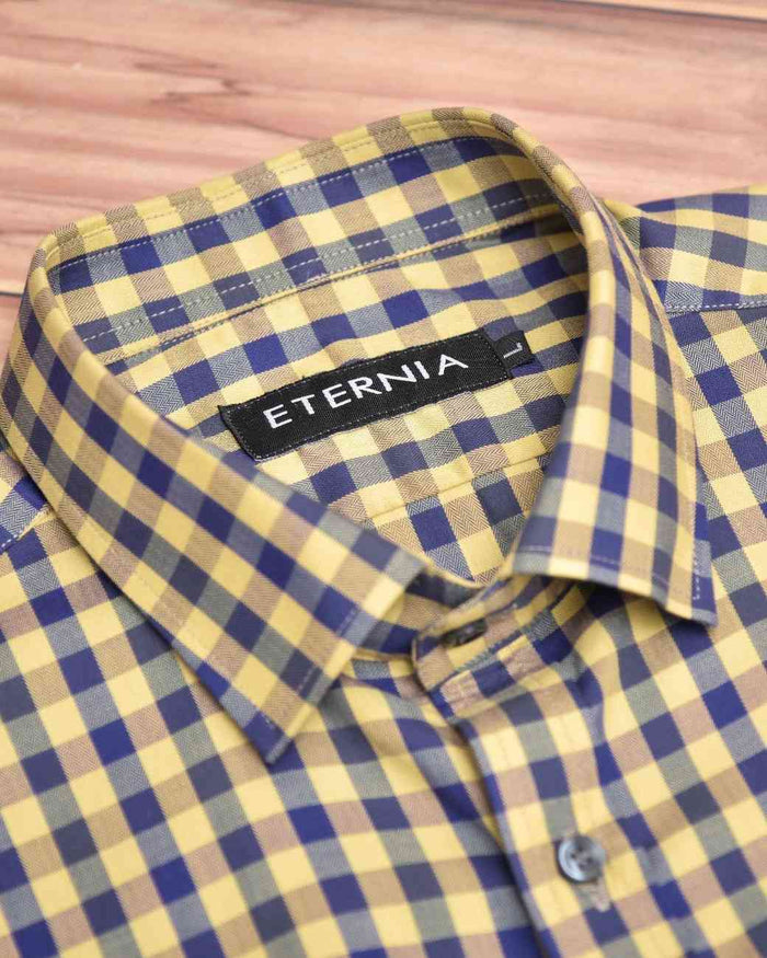 Men's linen shirt collar with yellow-and-blue check pattern and button placket