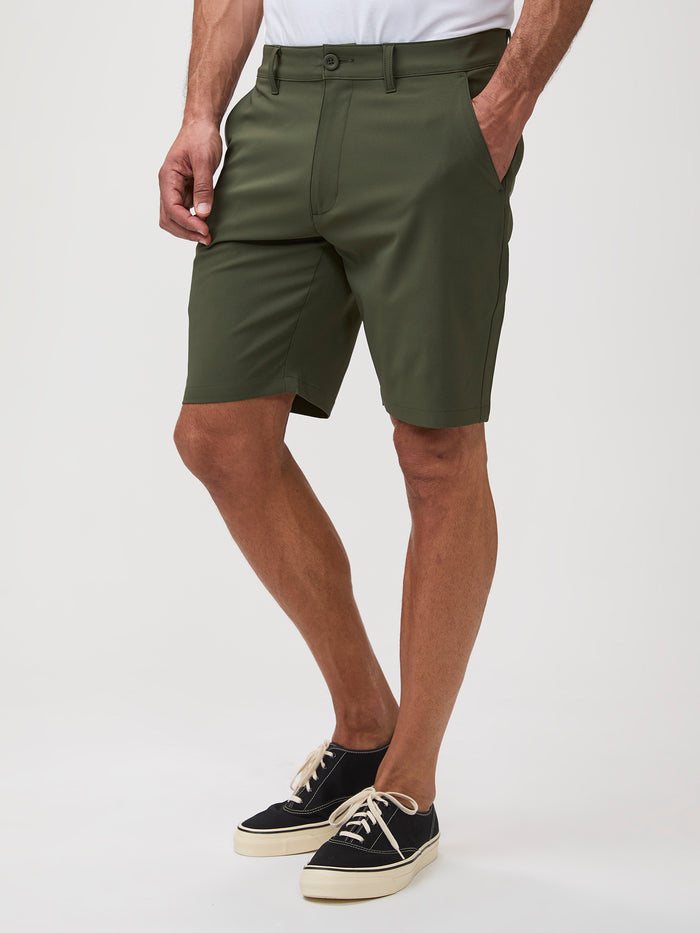 4-way stretch, moisture-wicking # Person wearing olive green shorts | Everyday Shorts, Ultra Comfortable & Soft