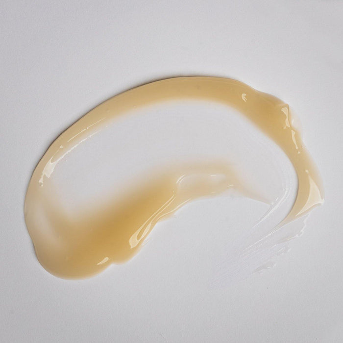 Clear gel texture swatch on white surface for Firming Gel For Neck and Bust | Alchimie Forever, highlighting skincare body care with a smooth, lightweight consistency.