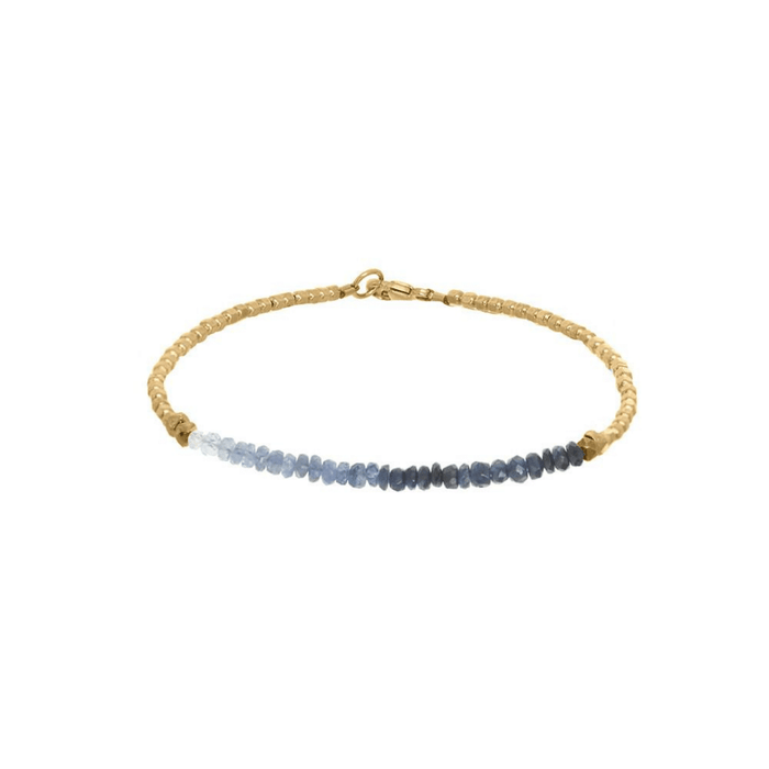 Gemstone Fade Bracelet | Catherine Weitzman Jewelry featuring delicate blue gemstone beads that fade in color, strung on a gold-tone beaded chain with a clasp closure.