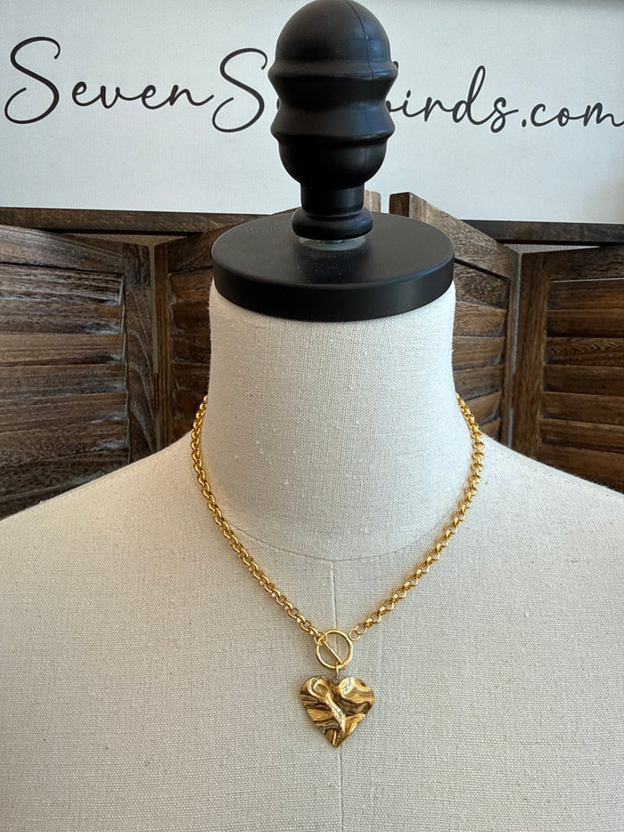 Gold-tone hammered heart toggle clasp necklace with cable chain and heart pendant