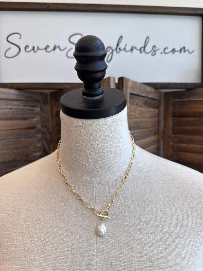 Gold stainless steel chain necklace with toggle clasp and white pearl drop