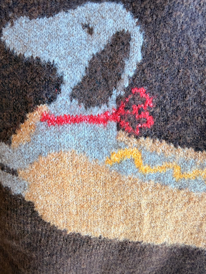 Knit crew neck sweater with hot dog dachshund intarsia graphic, light blue and tan