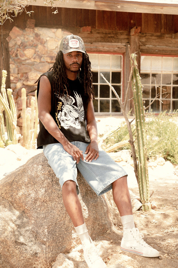 Unisex Hubal Netplus Trucker Hat in the color Tree Camo/Olive - Men's Lifestyle image