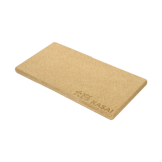 A beige Kasai Konro Heat Mat for Medium Long Grill laid flat on a surface.