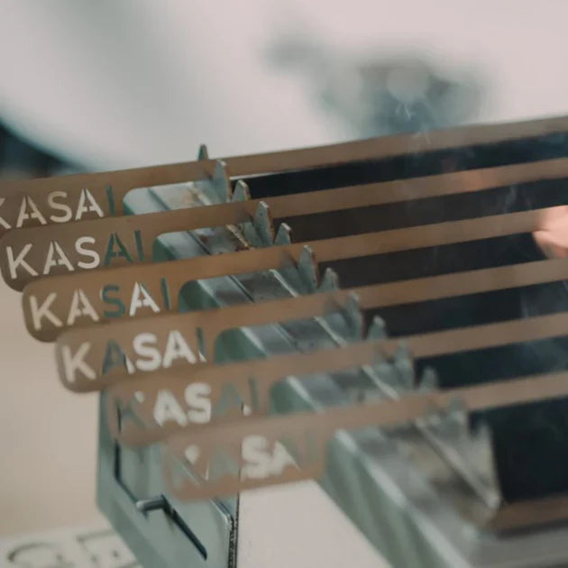 Stainless steel "Kasai" Skewers on rack ontop of Kasai Grill.